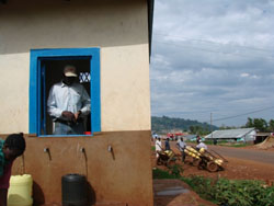 One of the operational water kiosks in Kisii, with private water vendors in the background [photo: Dick Foeken]